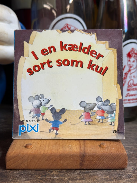 I en kælder sort som kul
