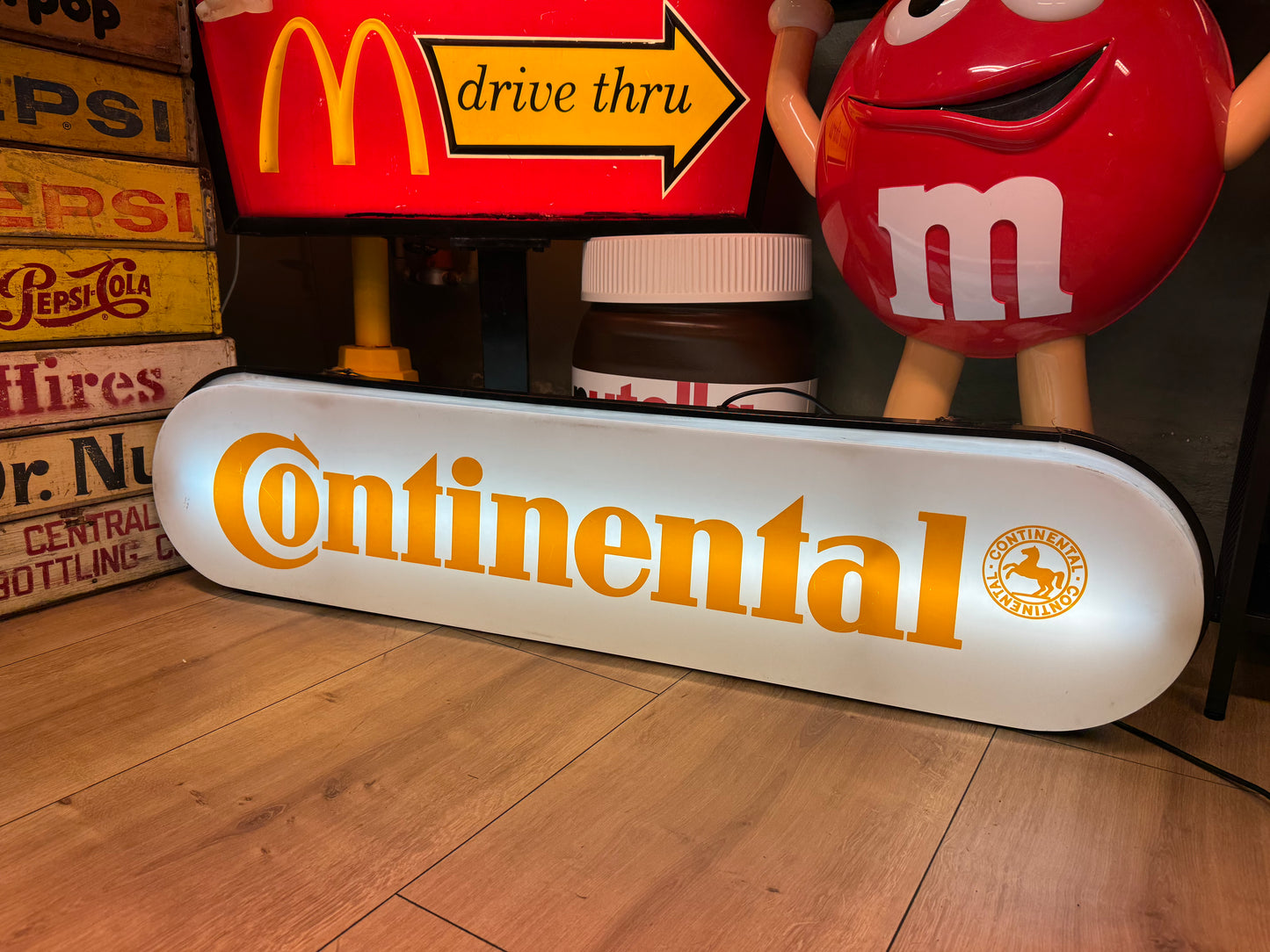 Continental lysskilt