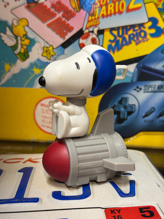 Snoopy on a rocket