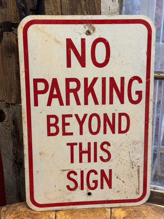 No parking beyond this sign