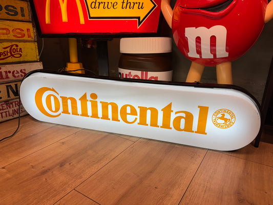 Continental lysskilt